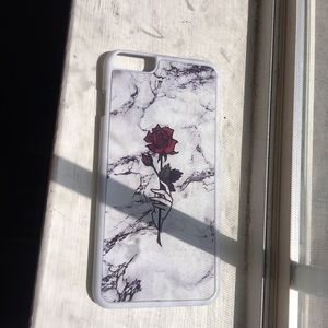 I am selling this Cute Rose IPhone 6s Plus Case